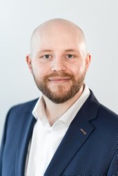 Tim Reuscher