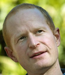 Damian H. Adams