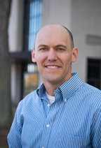 Justin E. Heinze