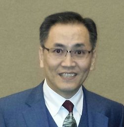 Eugene W. Shek