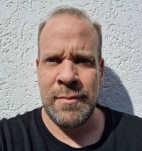 Gregory J. Mills