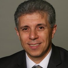 Mehmet E Dokucu