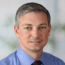 Mark J Travers