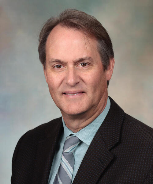 John K. DiBaise