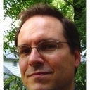 Eric K Neumann