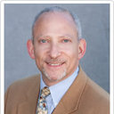 Neil H Stollman