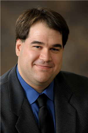 Douglas M King