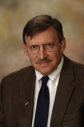 Charles E. Savrda