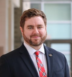 Adam J. Macneil