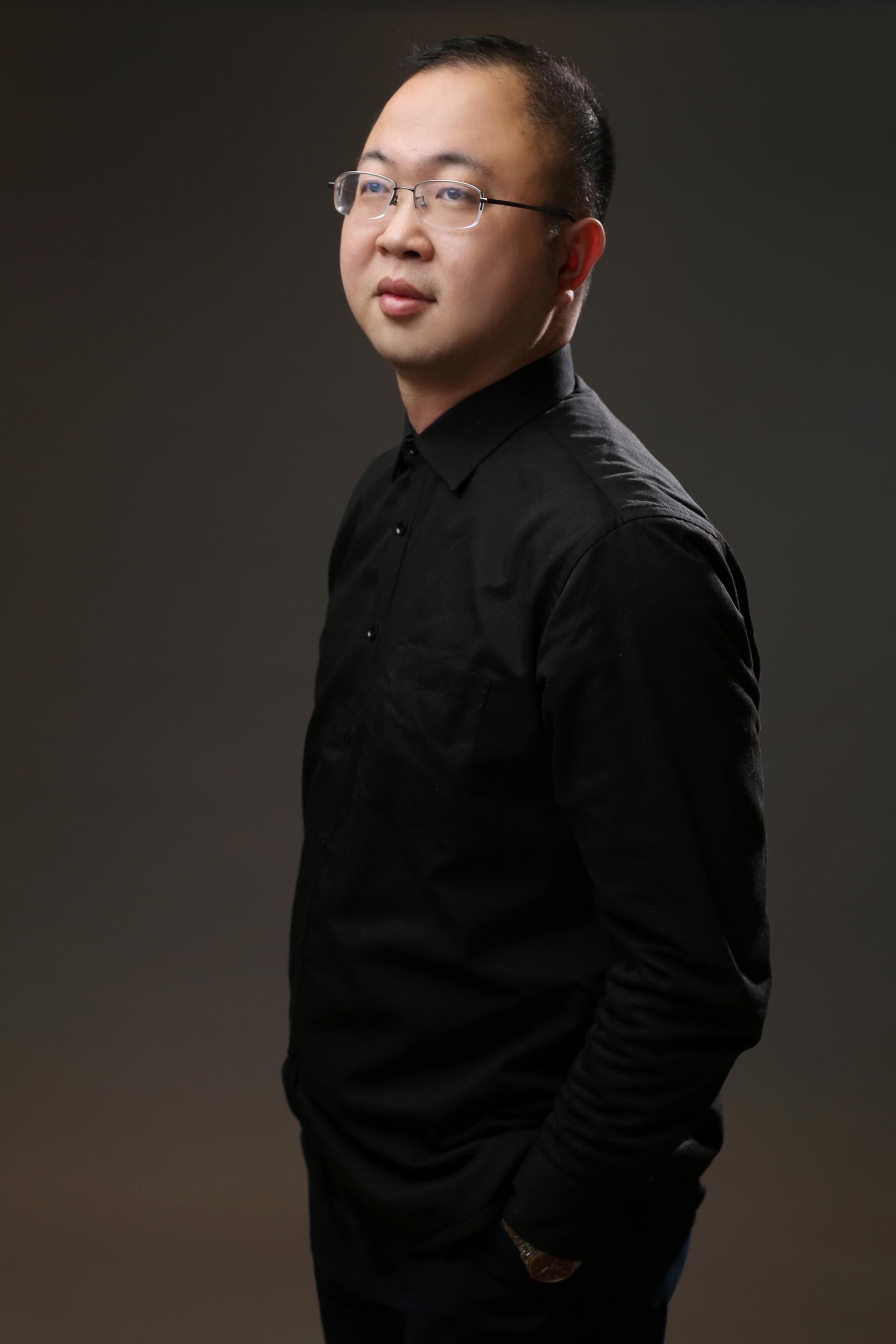 Zhiqi Huang