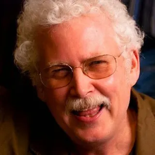 Robert E Schumacher