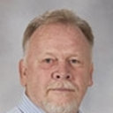 Warren L May