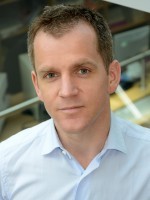 Simon J Brooker