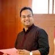 Dr. Milind Thomas Themalil