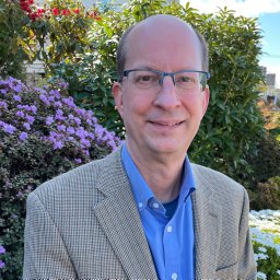 Mark E. Bussell