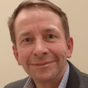 Andrew T King