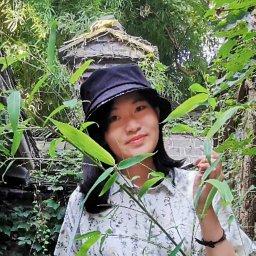 Joy Xiaoji Zhang