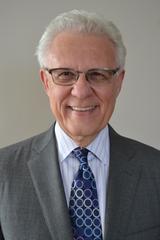 Dennis P West