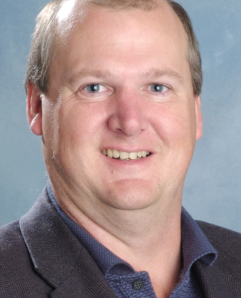 Greg J. Evans
