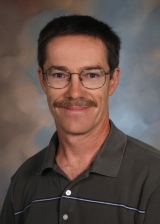 BRADLEY A. YODER