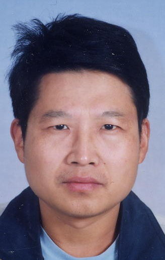 Xueguang Wang