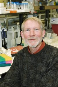 Mark E. Cook