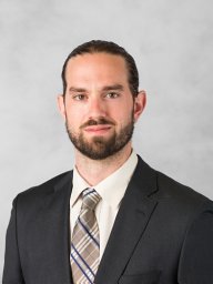 Evan J Kyzar