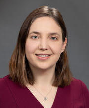 Emily L. Breza