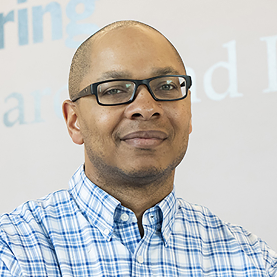 Mark E. Lewis