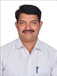 Mahesh B.